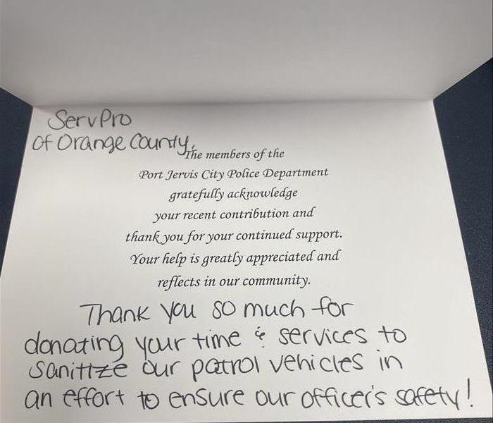 opened thank you card from Police Dept