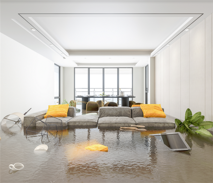 a flooded family room with water covering everything