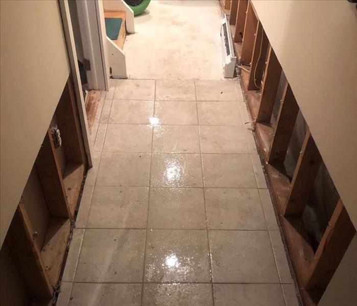flood cuts in hallway, tile floor, equipmet