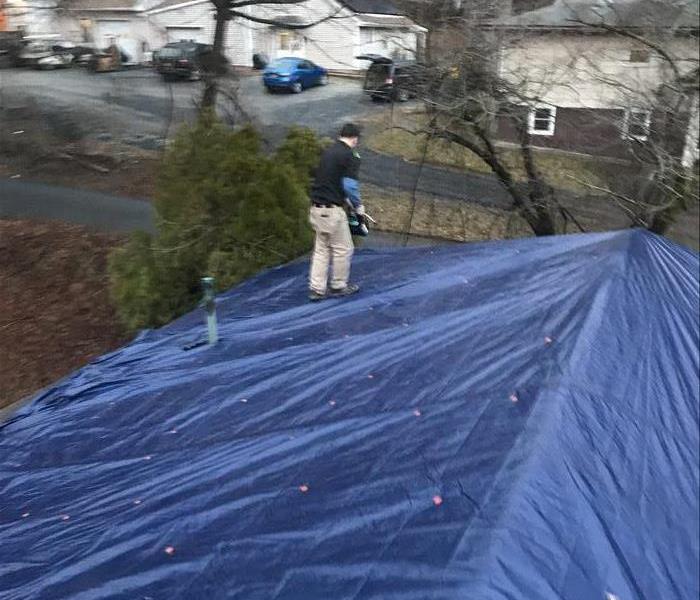 blue tarp on roof